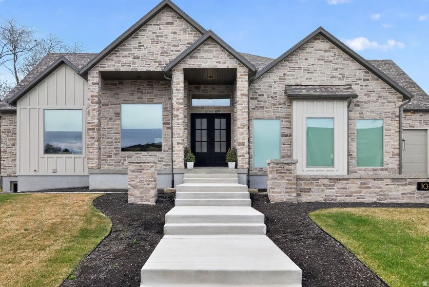 Exclusive premier lot, stunning views, magnificent home. 12-foot ceilings, 12' premium cabinetry, Wolf/Sub-Zero appliances, 8' doors, all designer premium finishes. Huge 3rd car w/RV&EV power. Prof. Landscaped w/flagstone fire pit rear, courtyard front. Basement is framed with HVAC installed and ready to go - a potential of 2 additional bedrooms and bathrooms, a full laundry room, and spacious basement kitchen. It wouldn't take much for potential buyers to finish to their own styles and taste.