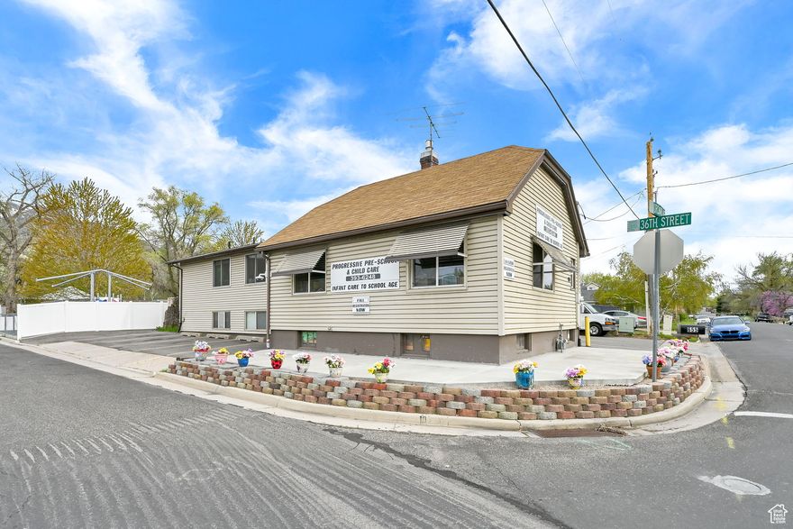 Rare investment opportunity - Previous run as a daycare; building in a prime growth corridor. Perfect for an owner-operator, investor, or developer. Real estate alone makes this a smart buy, with income potential from childcare or alternative commercial use.  This has been completely remodeled and set up for success. New gorgeous cabinets and granite in kitchen and offices. Updated furnaces, ac units, plumbing and electrical. New playground 2 years ago. Garden area, basketball hoop, large pavilion with tables, multiple play areas. Entire building built for safety and efficiency. 4 classrooms, 3 bathrooms with a total of 8 toilets(including adult and children size), 3 offices. Multiple sinks built in for kids, drinking fountains, updated pull out shelves for amazing storage, teacher lockers, lots of storage spaces. Every classroom has hepa filters and building has a  Curis sanitize system. Security Cameras installed in every room, Secured entry lobby. 11 parking spaces. All equipment is included in the sale including 2 15 passenger vans. Ask agent for list of equipment. Property appraised a few months ago at purchase 880K without all equipment included. Main office and building were built in 1936, rest of building was built in the mid 70's. Call agent for more details and get your successful business going! Contact Agent for showing code.