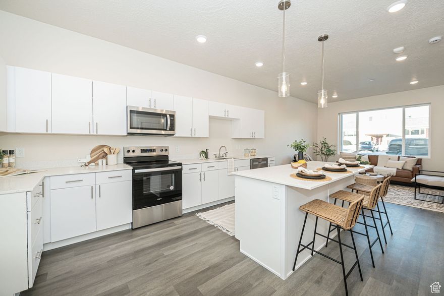 *PRICE REDUCED* These BRAND NEW move-in ready condos can become your home for an affordable price. Discover the newest modern condos in Ogden with a variety of stylish floor plans, layouts, and options for 1-bedroom/1-bath and 2-bedroom/2-bath units, there's something for everyone. These units are brand new, and you can secure yours today with FHA-like financing through Zions Bank! Located in a prime area, you'll be just steps away from fantastic shops, dining, and entertainment. Ogden is known for its outdoor adventures, mountain views, and easy access for commuters. For more details, reach out to Kelsey!