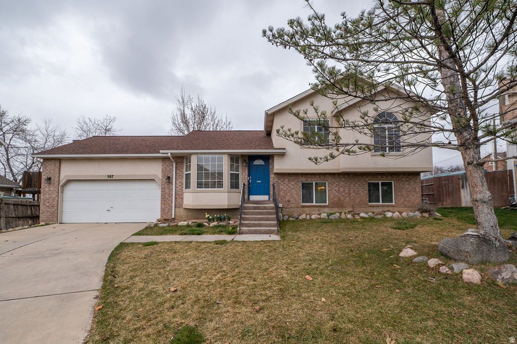 Photo of 587 E EASTPOINTE CIR N, North Salt Lake, UT 84054 (MLS # 2142281)