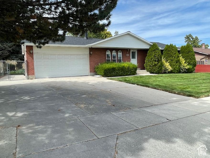Welcome home to this 6 bed 3 bath rambler has been lovingly maintained inside and out. Generous rooms filled with light throughout.  The washer, dryer and fridge stay! The roof is only 1 year old! Basement has newer carpet, an oversized family room, large laundry and storage area!  The yard is fully landscaped and beautiful! The backyard is fenced, and there is RV parking. This is a house you don't want to miss out on!!