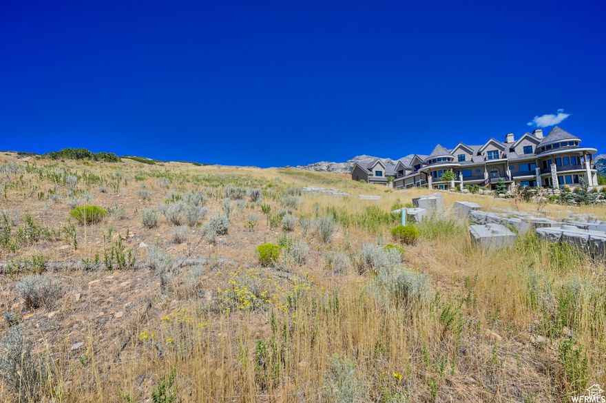 Build your dream mountain retreat on one of the few remaining lots in the highly desirable Heritage Hills community. Tucked away on a quiet cul-de-sac, this property showcases incredible panoramic views of Mount Timpanogos and offers a rare sense of privacy. The lot backs to HOA open space and Forest Service land, creating a peaceful natural setting with no rear neighbors. Its sloped terrain is ideal for a custom terraced home designed to take full advantage of the surrounding views and landscape. A unique opportunity to create a one-of-a-kind home in one of the area's most sought-after neighborhoods. Buyers and buyers agents to verify all information provided. Information provided as a courtesy only.