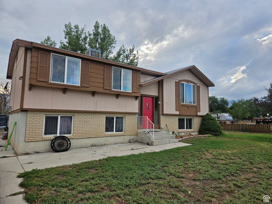 Square footage figures are provided as a courtesy estimate only and were obtained from county records..  Buyer is advised to obtain an independent measurement.  New 800 sq. ft. covered deck.  This deck has 4 levels.   The electrical  outlets and switches has been updated.   Other updates are listed in the seller's disclosures.  This home has an extra large lot with great potential.  Garden area and grape and strawberry are already established.  2 storage sheds and plenty of storage in the basement area.  This home is located in the heart of Orangeville.  2 hours notice to show.