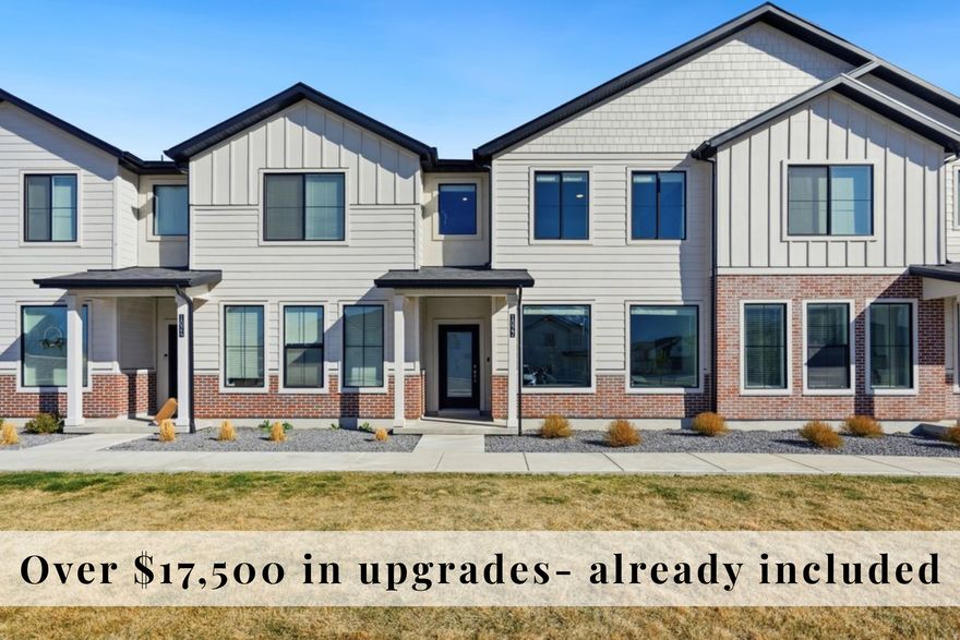 *Be sure to click the tour button for the 3D tour* Better than new and priced below the builder. This upgraded 3-bedroom, 2.5-bath townhome offers over $17,500 in builder upgrades and is positioned in one of the most desirable locations within the community.  Step inside to 9' ceilings and durable LVP flooring throughout the main level, complemented by modern black hardware and an oversized kitchen island, perfect for gathering and everyday living. The open-concept layout flows seamlessly into a spacious living area, while the 2-car garage adds convenience and functionality.  Upstairs, you'll find a versatile loft space ideal for a playroom, office, or second living area. Two bedrooms feature custom accent walls, adding character and style.  This unit is uniquely situated with a large grassy area right out front, nearby guest parking, and close proximity to the community mailboxes. Enjoy easy access to the neighborhood amenities including pickleball courts, hammock areas, playground, pool, and park, all just a short walk away.  Located near the new recreation center, scenic trails, and parks, this home offers both convenience and lifestyle.