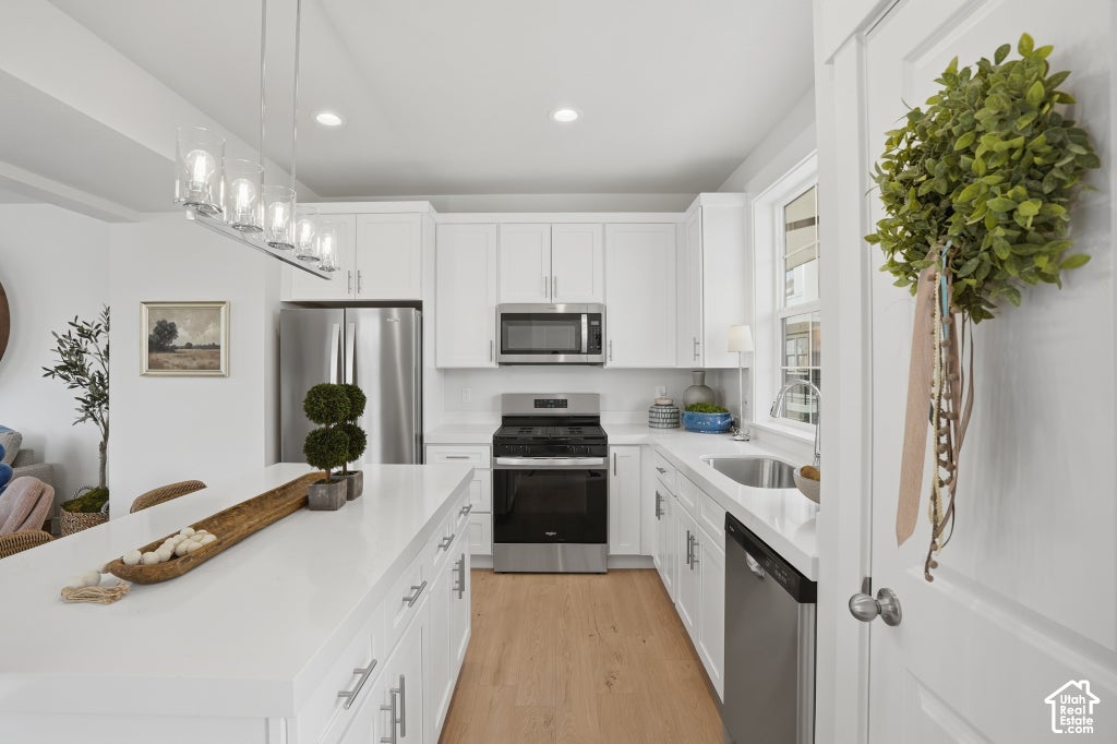 Photo of 338 W CHADAM WAY S #107, Midvale, UT 84047 (MLS # 2193348)