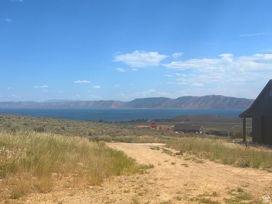Build the BearLake retreat you've been dreaming of on this spatiouse 0.72acre homesite in Omega Sub4. Nestled at the end of a quiet culdesac, the reversepie lot widens toward the back, bordering common open space for extra privacy. A moderate slope and eastern exposure invite a walkout or tiered design with allday light and potential lakeview vignettes to the northeast (verify to buyer's satisfaction). Culinary water, power, and sewer are nearby-standard connection fees apply. Gravel road access; street is not plowed by the HOA in winter. Current county zoning allows shortterm rentals; buyers should confirm any HOA or municipal requirements. Larger than most neighborhood parcels, this property offers room to breathe without giving up convenient proximity to Garden City and BearLake recreation. Information provided as a courtesy-buyer to verify all.