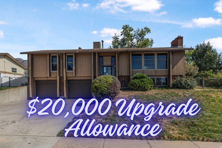 *The seller is willing to entertain ANY and ALL requests in an offer, in addition they are offering $20,000 allowance for buyer to use for upgrades.* New carpet! Two spacious living rooms with two beautiful brick fireplaces are filled with natural sunlight streaming through top-of-the-line Anderson windows. The upgraded kitchen and new A/C give you a great start-now it's your turn to make it shine. With good bones, tons of character, and a large fenced yard with mountain views, this home is ready for your creative touch.