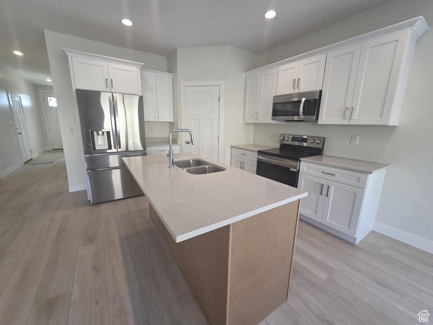 Brand New Home with Legal ADU & Stunning Front Yard Landscaping  Don't miss this incredible opportunity to own a just-built home featuring a versatile, income-producing LEGAL Accessory Dwelling Unit (ADU)-perfect for multi-generational living or rental income. The ADU is thoughtfully designed to function as either a 2 or 3-bedroom unit, offering flexibility and long-term value. Enjoy the benefits of working with a generous builder who is offering $12,000 toward your closing costs when using the preferred lender! This home boasts a smart, functional layout, high-quality finishes, beautifully landscaped front yard, and an unbeatable location-just minutes from a local golf course, scenic reservoir, walking trails, shopping, dining, and more. Whether you're an investor, homeowner looking to offset your mortgage, or simply want room to grow, this property checks all the boxes. Call today to schedule your private showing and take advantage of this amazing opportunity before it's gone!