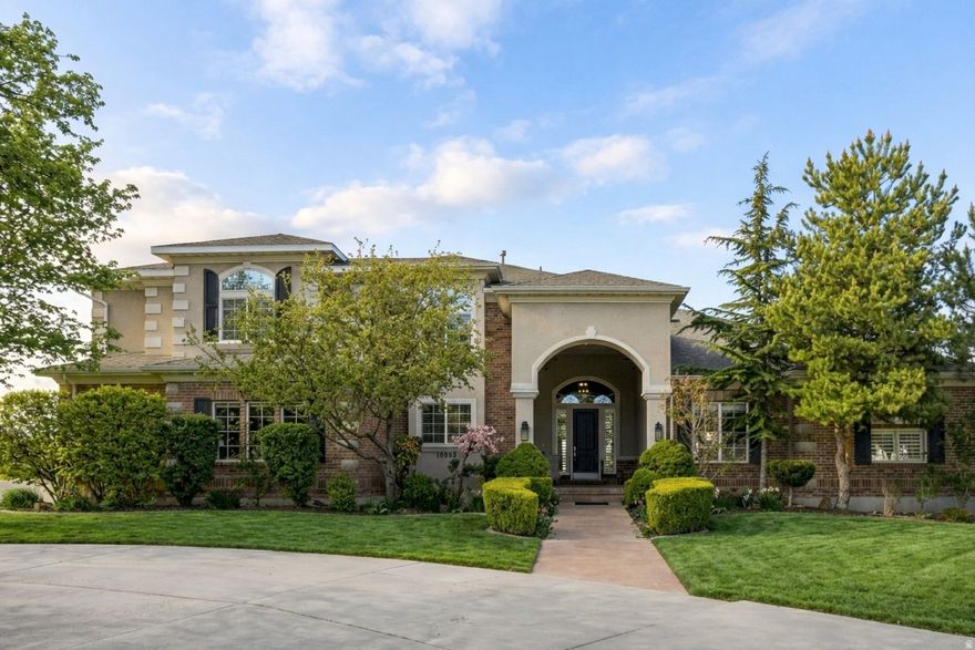 Located in one of Sandy's most desirable areas, this inviting home offers comfortable living on a quiet street with easy access to skiing, hiking, and horseback riding. A large front porch sets the tone for the home's warm and gracious atmosphere. Inside, expansive windows fill the interior with natural light, highlighting wood floors and custom woodwork. The generous floor plan includes ensuite bathrooms, multiple gathering areas for both everyday living and entertaining, and a well-appointed primary suite with ample room to relax. The fully finished walkout basement features an oversized family room and wet bar, well suited for both daily living and hosting. The private backyard includes a covered deck for dining, a swimming pool, spa, and sauna, along with an expansive poolside patio with plenty of space for outdoor living and lounging. Just beyond the property line, neighborhood equestrian trails provide direct access to Dimple Dell Park. Visit the property website!