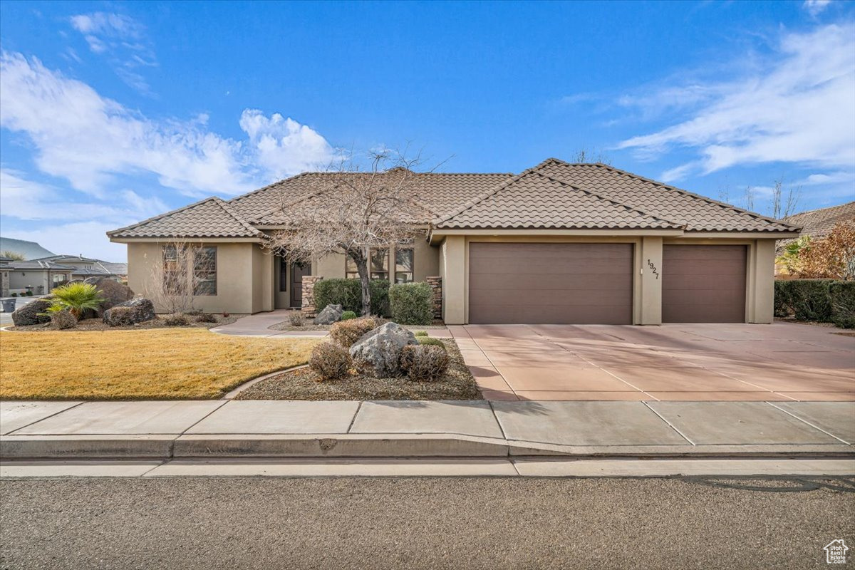 Nestled in a fantastic neighborhood, on a corner lot is this beautifully upgraded home. Recently installed solar panels make this home energy-efficient while the upgraded bathrooms, light fixtures with updated electrical fixtures and ceiling fans throughout add a modern flare. The main living areas feature new tile flooring and a cozy fireplace. The kitchen is exceptional with granite countertops, stainless steel appliances and separate pantry room. The master en-suite is gorgeous with exposed rock, walk-in shower, walk-in closet and a separate bathtub. The laundry room is 6x10 with storage, hanging rack and a utility sink. The backyard is a private oasis, enclosed by a CMU wall featuring a private pool, hot tub, artificial grass, and a shaded concrete patio under a mature tree. This home is ideally located near two major grocery stores, restaurants, mechanic shops, and scenic trails. Situated approximately 1 mile from schools and with easy access to major roads, this home combines privacy with convenience. There is also additional storage space under the stairs for even more space and convenience.