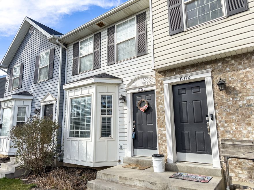 This beautifully updated 3-bed, 2-bath townhome is filled with natural light and designed for comfortable, modern living. Enjoy the best of both worlds: quick access to a wide array of restaurants, shopping, and freeway connections, all while nestled in a quiet neighborhood surrounded by beautiful parks within walking distance; including one featuring pickleball courts and a brand-new playground. This welcoming community is full of young families with kids of all ages, offering local playgroups, book clubs, and spontaneous park meetups that make it easy to feel right at home.  Inside, you'll find updated LVP flooring and plush carpet, elegant wainscoting, stylish lighting fixtures, a spacious crawl space for storage, and wired Ethernet for seamless connectivity; perfect for working from home or streaming with ease. Step outside to your private patio, ideal for summer barbecues, relaxing evenings, or cultivating a small garden. With direct backdoor access to a large green space, it's perfect for entertaining, playtime, or laid-back picnics just steps from home.