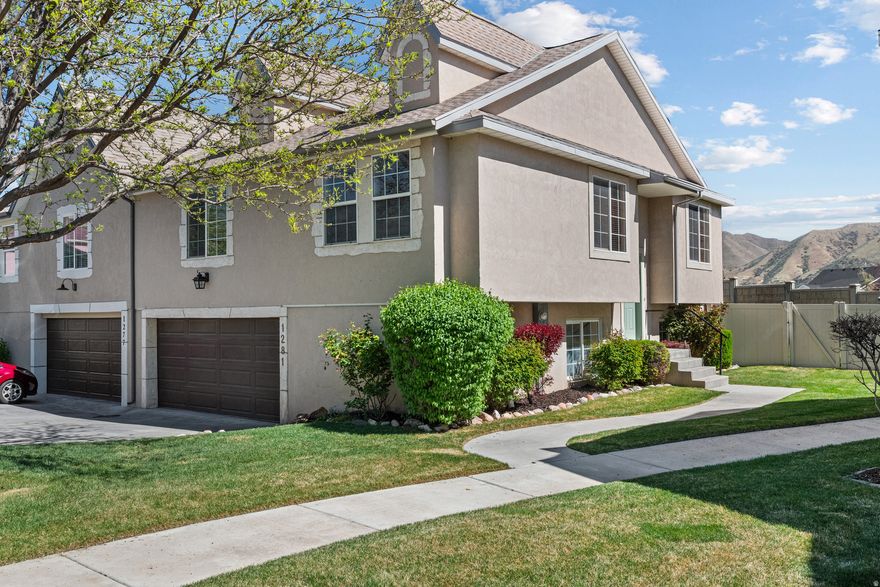 Well-maintained Spanish Fork home with inviting curb appeal, charming front entry, spacious living areas, and abundant natural light. Kitchen features attractive cabinetry, ample storage, and functional prep space. Flexible floor plan with comfortable bedrooms and additional living space. A large deck, a fully fenced yard, and a storage shed offer great outdoor space and convenience. Convenient location near parks, schools, shopping, and everyday amenities. Buyer to verify all information. Square footage figures are provided as a courtesy estimate only, and Buyer is advised to obtain an independent measurement.