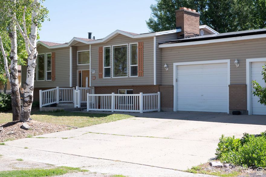 Updated home on a large lot with solar power, modern ktchen, fenced pasture, greenhouse, fruit trees, hot tub hookup, chicken coop, outbuildings with power, and a playground! Perfect for hobby farming or sustainable living in a great community with Movie Theatre, Library and Grocery Store within walking distance. Don't miss out on this rare gem-schedule a tour today?