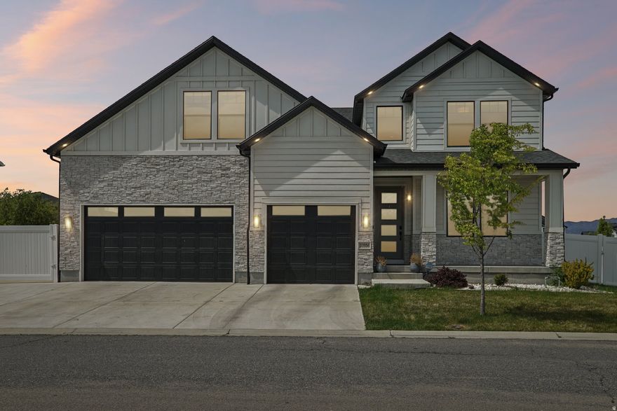 Stunning 5-bedroom home with sweeping Wasatch Mountain views-expertly upgraded with over $70,000 in high-end finishes and thoughtful enhancements. This one-of-a-kind property offers exceptional value and is designed to impress even the most discerning buyers. The spacious layout features 5 bedrooms, 3.5 bathrooms, a 3-car garage, a dedicated office, and a versatile bonus room that can easily serve as a fifth bedroom or additional workspace. Situated on a premium lot, this home is perfect for those seeking a low-maintenance lifestyle without sacrificing outdoor enjoyment-ideal for busy professionals or frequent travelers. Step outside to a fully landscaped yard designed for both relaxation and entertaining, showcasing uninterrupted, year-round Wasatch Mountain views. The desirable east-facing orientation helps melt winter snow efficiently while providing cool, shaded comfort for summer evenings on the covered patio that has a built in gas firepit. Inside, the home blends timeless design with modern functionality. The gourmet kitchen is a standout, featuring natural wood cabinetry, quartz countertops, a stylish tile backsplash, double ovens with a gas range, and a spacious pantry with potential for a butler's pantry conversion. Luxury vinyl plank flooring flows throughout, complemented by custom accent walls, designer lighting, and a striking fireplace surround that anchors the living space. Additional highlights include built-in shelving, well-designed walk-in closets, and automatic shades for effortless control of evening sunlight. Home also has a $10,000 reverse osmosis system installed. Whether you're enjoying the panoramic mountain views outdoors or the elevated finishes inside, this home delivers a rare combination of comfort, style, and convenience. Opportunities like this don't come along often-schedule your private showing today. Seller requests 2 hr notice for showings. **Buyer/Buyer Broker is advised to obtain an independent measurement. Buyer/Buyers Agent to verify all info including sq. ft.