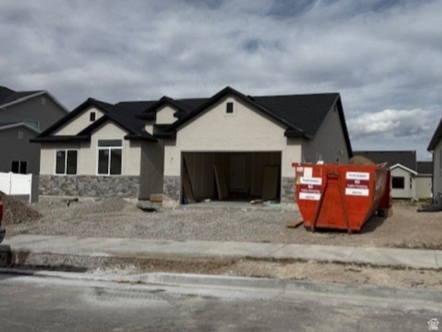 This is the popular Alternate Roosevelt  2 car floor plan. Same plan as the model home. Clear alder stained cabinets, quartz countertops, tiel in all wet areas. Ask about our preferred lender incentive. Estimated completion April. 4000 sq ft sod given by builder. Square footage figures are provided as a courtesy estimate only and were obtained from plans . Buyer is advised to obtain an independent measurement.