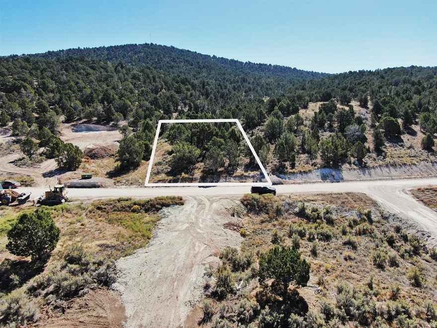 Ready to Build & Ready for Adventure  Lot 73 is Calling! Plus receive $20,000 as a Seller Credit, to help cover connections fees, and get the ball rolling on your dream project! This lot is fully prepped and ready for immediate construction, with an active operating permit already in place-meaning your dream home is closer than ever! Tucked in a tranquil mountain community, this property offers the perfect blend of seclusion, recreation, and accessibility. With year-round access and direct trail connections for ATVing, snowmobiling, hiking, biking, and horseback riding, it's a true outdoor lover's paradise. Located just 30 minutes from Spanish Fork Canyon and easily accessed from Highway 89, you'll enjoy both serenity and convenience. Coming soon to the development: a 2.5-acre swimming lake for paddle boarding and kayaking, plus an exclusive beach club for members to relax and recharge. Best of all? The HOA is just $500/year-covering road maintenance and future amenities-and is incredibly friendly and flexible when it comes to building plans and design. This isn't your typical HOA; it's designed to support your vision while delivering serious lifestyle perks. Don't miss this rare opportunity to claim your slice of mountain heaven. Schedule your private tour today!