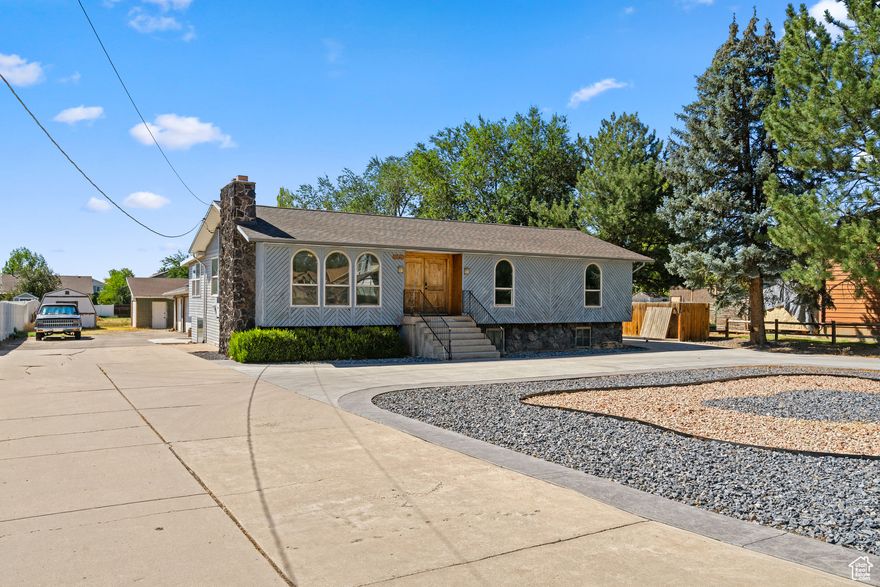 Spacious, flexible, and built for life; there is so much potential! This 6-bed, 3-bath home pairs big interior spaces with serious garage capacity and nearly a full acre of land. The walkout basement already has a kitchen rough-in-ideal for multigenerational living, a future mother-in-law suite, or a private guest space with its own entrance. Tackle projects year-round in the heated detached 3-car garage, and stash the toys, tools, or extra vehicles in the second extra-deep garage/shop. The lot has so many options: garden, keep animals, or explore subdividing for additional lots or a family compound (subject to city/county approval). Properties with this blend of space, utility, and upside don't come along often-bring your vision and make it yours.