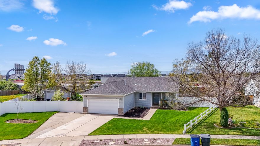 This move-in-ready home is ideal for first-time buyers looking for comfort, value, and peace of mind. Enjoy newer appliances including refrigerator (2021), microwave (2021), stove (2021), dishwasher (2026), and laundry machines (2023), along with durable new LifeProof LVP flooring throughout (2026). Big-ticket updates include a new roof (2020), new deck (2022), new landscaping (2025), and a new sprinkler system (2025). The yard features raised garden boxes with a drip system plus peach, pear, and apple trees, also on drip irrigation - perfect for easy outdoor living. A great opportunity to own a beautifully updated home with many major improvements already completed!  Square footage figures are provided as a courtesy estimate only and were obtained from previous MLS.  Buyer is advised to obtain an independent measurement. All information is provided as a courtesy only and was obtained from the previous MLS listing.