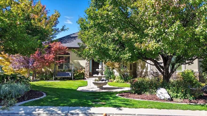 Stunning 4 bed, 5 bath home in the heart of Draper offering a perfect blend of elegance and comfort. Beautiful hardwood floors, soaring ceilings, and custom crown molding enhance the open, light-filled living spaces. Includes two master suites, spacious walk-in closets, cozy fireplaces, and a central vacuum system. Large windows frame beautiful valley views, while community amenities feature a clubhouse, pool, and event space. Located just steps from scenic walking and biking trails, this home delivers luxury in one of Draper's most desirable neighborhoods. Listing agent is related to seller