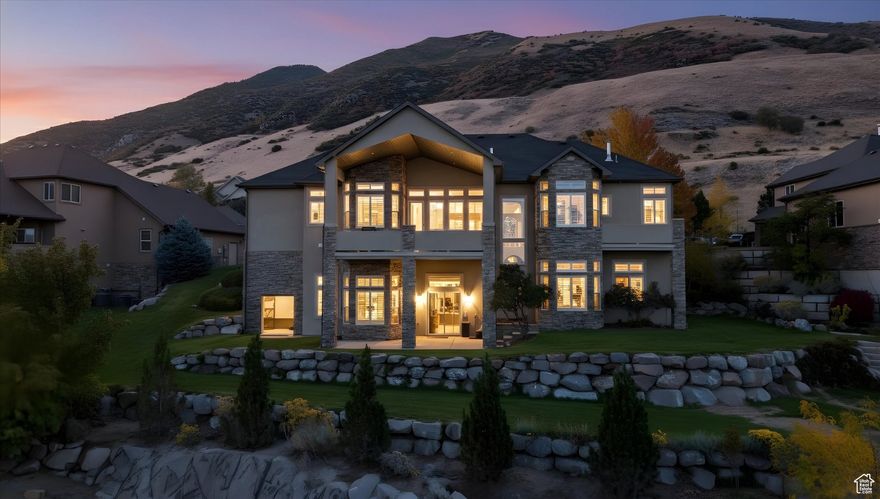 Stunning 4 bed, 5 bath home in the heart of Draper offering a perfect blend of elegance and comfort. Beautiful hardwood floors, soaring ceilings, and custom crown molding enhance the open, light-filled living spaces. Includes two master suites, spacious walk-in closets, cozy fireplaces, and a central vacuum system. Large windows frame beautiful valley views, while community amenities feature a clubhouse, pool, and event space. Located just steps from scenic walking and biking trails, this home delivers luxury in one of Draper's most desirable neighborhoods. Listing agent is related to seller