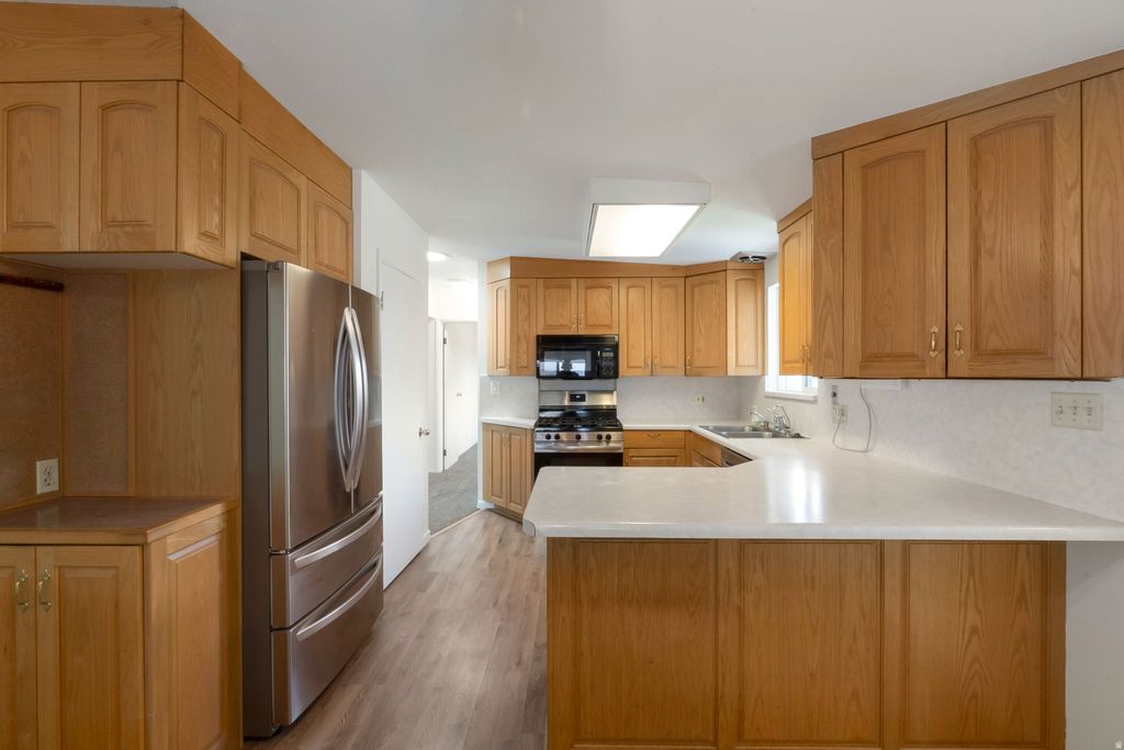 Photo of 4057 S LAREDO WAY, West Valley City, UT 84120 (MLS # 2160394)