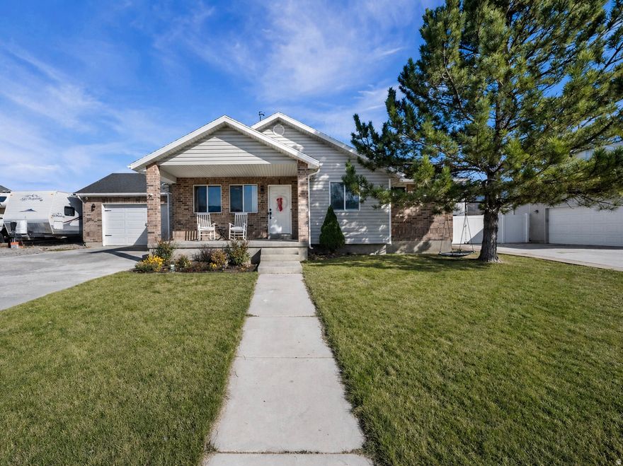 This beautifully updated 4-bedroom, 3-bath home offers the perfect blend of comfort, style, and functionality. Featuring a great layout designed for everyday living and entertaining, the home is filled with abundant natural light that creates a warm and inviting atmosphere throughout. Thoughtful updates add modern appeal while maintaining a welcoming feel. This home features new garage door was in 2022, new furnace in 2024 and the sprinkler system was replaced in 2022. Step outside to enjoy the mature trees that provide exceptional shade and privacy-perfect for relaxing or hosting during the summer months. This is a home that truly checks all the boxes.