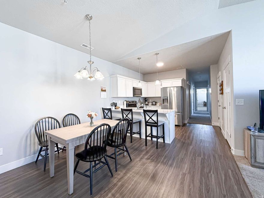 Top-floor condo in the desirable Wildflower community! Enjoy vaulted ceilings, quartz kitchen countertops, and abundant natural light. Includes single-car garage, driveway parking, walk-in closet, and extra storage. Enjoy endless, adventure-filled amenities including a private lake with a beach, a heated pool, two playgrounds, pickleball and volleyball courts, and a dog park with washing stations. Seller is offering to cover the HOA transfer fees and include the refrigerator as an appliance.