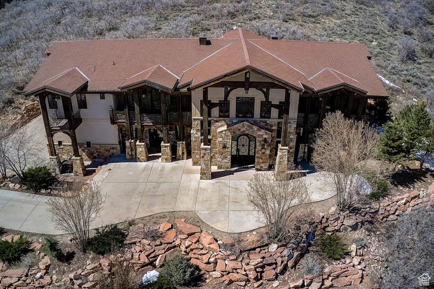 Looking for space inside and out, but close to everything Park City?  Amazing views abound from this 6 bed, 5 1/2 bath 7880 sq ft  mostly furnished home with soaring  30 ft cathedral ceilings, stone work, marble, granite and everything that screams old world elegance.   With a  grand open entry/living room feeding into the kitchen, dining, home bar, and office space, this home is an entertainers dream.  The home boasts 7 fireplaces, a 1000 square foot Master Suite, 5 more very large bedrooms, a theater room,  an executive office/den,  jacuzzi, Chef's Kitchen, and a 4 car garage.  Access to Sun Peak Pool and Clubhouse.   Located just 1 mile from Park City Canyons Village and 5 minutes from Park City Ski Resort. LEASE INFORMATION  Available with a 1 year lease. Shorter term lease will be considered.   Utilities not included in rent.  First month's rent and security deposit due upon signing. NO SMOKING/VAPING. PETS NEGOTIABLE.  Verification of funds and employment required.    The information contained herein is furnished to the best of knowledge. Tenant and/or tenant's agent responsible to verify the accuracy of all information. This information is subject to change without notice. Brokerage assumes no responsibility for accuracy.