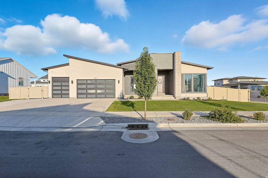 **PRICE SLASHED $100,000! END OF THE YEAR SALE!** This move-in-ready custom home is an entertainers/computer geeks/chefs dream. The kitchen comes complete with quartz countertops, double oven, cabinets everywhere, two pantries, a butlers pantry, and an oversized center island. The greatroom is ideal for entertaining large groups, highlighted by a cozy gas fireplace and still room for a dedicated dining room. A multi-sliding glass door opens to a covered deck, creating the perfect space for outdoor gatherings, plumbed with multiple gas lines for grills and fire-pits. Spacious secondary bedrooms include generous closet space. The primary suite adjoins a spa-like bathroom with a large walk-thru shower with dual shower heads, free-standing tub, dual-sink vanity, private water closet, and a walk-in closet that connects directly to the laundry room. The geek will be satisfied too, every room has LAN drops and extra electrical outlets including a work from home oasis that has enough space to house multiple computers for your personal and professional life. 1gbps dedicated fiber internet available. Newly finished basement includes drops for theater equipment and space for all of your gamers. A car charging port in the garage and extra outlets for freezers. This house will entertain, provide for the professional life, allow for an extended family and provide for the gourmand. This community is conveniently located just minutes from shopping, dining, and entertainment at the new Ballpark, and also includes a playground, pickleball court, and park, ONLY 20 MINUTE DRIVE TO SILICON SLOPES. The sun-soaked design is bright and airy, featuring floor-to-ceiling windows that flood the space with natural light. Make an OFFER!  Assume the sellers' fixed 3.875% interest rate for a payment under $7,000/mo!