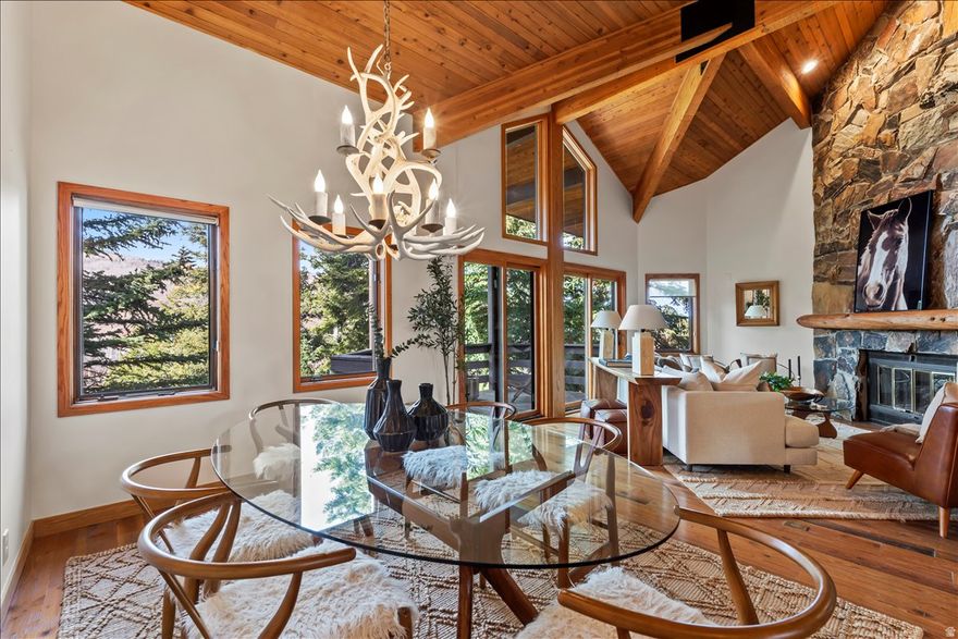 Tucked into a quiet enclave of just twelve residences, this Deer Valley townhome offers a rare blend of privacy, space, and year-round livability-bike from your front door, step onto nearby hiking trails, and enjoy being just moments from Historic Main Street in Park City.  Surrounded by mature aspens and mountain views, the home is designed to feel like a true retreat-close to everything, yet without the busy resort feel. With over 2,500 square feet, three bedrooms all with en-suite baths, and generous gathering spaces, the layout supports both relaxed weekends and effortless hosting.  After a day on the mountain, unwind on the private deck with fresh mountain air, taking in views of the surrounding peaks and the occasional wildlife passing through. In the warmer months, enjoy long evenings outdoors or cool off in the community pool-while in winter, your private sauna and community hot tub offer the perfect end to a day on the slopes. Expansive windows bring in natural light and frame the landscape, creating a seamless connection to the outdoors in every season.  Ideally positioned within one of Deer Valley's more established settings, you'll enjoy easy access to the slopes, trail systems, dining in Silver Lake Village, and the charm of Main Street-while benefiting from a sense of calm and permanence that's becoming increasingly rare as other areas continue to evolve.  Additional highlights include a heated garage with two dedicated parking spaces, a private storage shed for all your hiking, biking, and ski gear, thoughtful updates, and true lock-and-leave convenience-making this an exceptional option for a full-time residence, second home, or investment property.  Opportunities offering this combination of space, location, and privacy within Deer Valley are increasingly rare.
