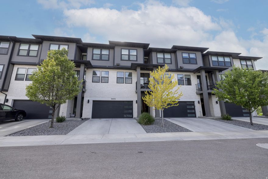 Welcome to this beautiful 2020-built Draper home boasting stunning mountain views and unbeatable proximity to I-15, dining, and Corner Canyon trails. Inside, the bright, open-concept layout features abundant natural light and plush, brand-new carpet. The gorgeous kitchen highlights an oversized island and stainless appliances, flowing seamlessly into a spacious living room and private balcony. Upstairs, unwind in the expansive primary suite with a large walk-in closet and ensuite bath. Featuring a two-car garage, and a truly turn-key residence or investment. Walk to nearby neighborhood parks, the splash pad, and the dog park.