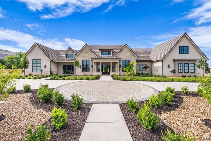 Discover a rare 5-acre estate, where modern luxury meets wide-open serenity. Completed in 2024, this thoughtfully designed home offers seamless accessibility with open living, a chef's kitchen with Wolf appliances, executive office, dual primary suites, casita option, gym, and designer finishes. Enjoy a sparkling 20x40 pool, oversized garage with dog bath, and future-ready EV and solar prep. With water shares included and a fully serviced barn pad ready for horses, agriculture, or a custom build, this property is both a private retreat and a canvas for your dreams, just minutes from Southern Utah's best amenities and natural wonders.