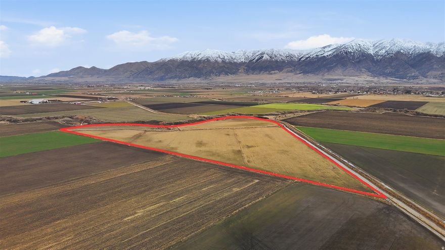 Rare opportunity to own 45 acres of prime farm ground in the heart of Bear River City, one of Box Elder County's most scenic and productive agricultural areas. This beautiful west-side property offers wide-open space, rich soil, and valuable water shares, making it ideal for continued farming, grazing, or long-term land investment.  The land is level to gently rolling, highly usable, and well-suited for crops, hay production, or livestock operations. With established water rights in place, this property delivers what serious ag buyers know is hard to find: land + water + location. Open skies, mountain views, and peaceful rural surroundings create a setting that's both productive and visually stunning.  Located in west Bear River City, the property offers a quiet country feel while remaining conveniently close to Brigham City, Tremonton, and I-15 access. Whether you're expanding an existing agricultural operation, securing land for future generations, or investing in one of Northern Utah's most desirable farming communities, this acreage checks the boxes.  This is legacy land-usable, dependable, and increasingly rare. Properties of this size with water shares don't come along often, especially in an area known for strong agricultural roots and long-term value.  Bring your vision, your operation, or your investment strategy. This is the kind of ground that works today and holds its value tomorrow.
