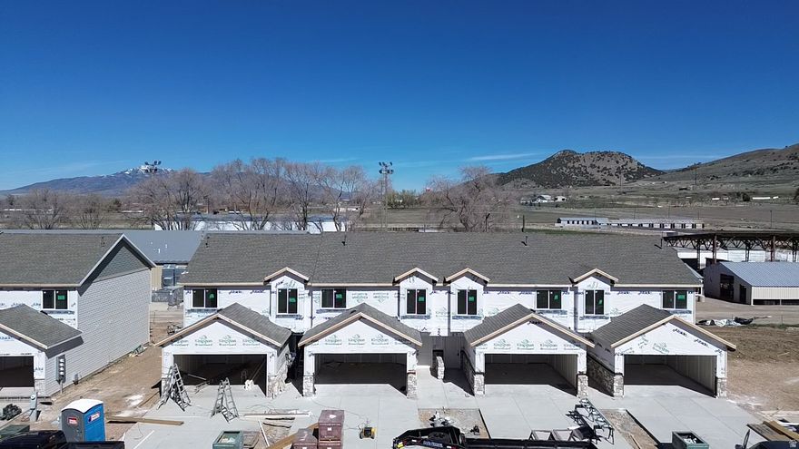 Now is your opportunity to own a brand-new townhome in Cedar Ridge, with completion set for April 2026. Located in Malad, Idaho, just minutes from the fairgrounds, this home offers beautiful mountain views and a convenient location near I-15, schools, grocery stores, and everyday essentials. Thoughtfully designed with modern finishes, it features quartz countertops and stylish accent walls. Whether you're looking for a smart investment or a place to call home, this property offers the perfect blend of comfort, style, and convenience. Schedule your showing today