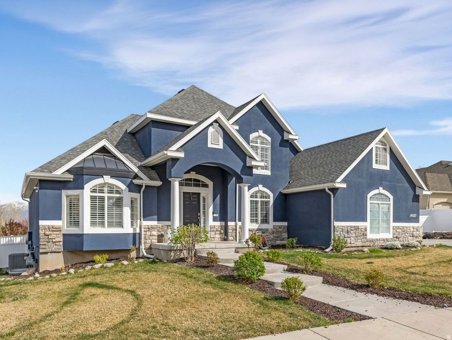 Welcome to this charming custom-built two-story gem updated in 2014  in beautiful Herriman City. As you step into the foyer, you're greeted by a gorgeous staircase that gracefully leads you to the upstairs bedrooms & bathroom Natural light pours through the windows, illuminating the high ceilings in the living room with its cozy fireplace. On the main floor, you'll find an office, a den that can be turned into an extra bedroom, the master bedroom with a unique diamond ceiling, and a master bath featuring a jet tub and separate shower. The laundry room is also conveniently on this level. Step outside to a fully fenced yard with auto sprinklers, RV parking, and those stunning mountain views. & of course, you're just three blocks from schools, church & parks, plus nearby horse trails & all the community charm. This home truly has it all!