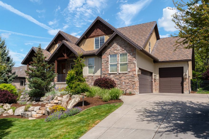 **OPEN HOUSE SAT. 5/2 11 AM - 1 PM** Perched along the coveted east bench of Davis County, this residence offers a rare harmony of elevated living and effortless accessibility-where the serenity of the foothills meets the pulse of the city just moments away. Tucked within the distinguished enclave of the "Hidden Springs community" celebrated for its design and livability, the approach is nothing short of cinematic: a beautiful water feature and graceful, tree-lined streets set the tone for what lies beyond. Residents enjoy an enviable lifestyle anchored by an exclusive clubhouse just steps away from this home, complete with a resort-caliber pool, spa, state-of-the-art fitness studio, and elegant gathering spaces designed for both relaxation and connection. Outdoor pursuits are seamlessly woven into daily life, with the foothills a mere block away and a newly curated mountain biking park just minutes from your door. Despite its tranquil setting, convenience remains paramount. The vibrancy of downtown Salt Lake City is a swift 15-minute drive, while the renowned Station Park-offering premier shopping, dining, and entertainment-is just five minutes away, delivering a lifestyle where everything you need is effortlessly within reach. Crafted by one of Utah's most respected builders, this two-story home is a study in timeless design and modern refinement. Thoughtfully updated with a new roof and HVAC system, the residence balances sophistication with comfort at every turn. The main level is designed for seamless living, anchored by a serene primary suite that evokes a private spa retreat, complete with a soaking tub, expansive walk-in shower, and dual vanities. The heart of the home unfolds in an open-concept kitchen and family room, where natural stone accents, rich hardwood flooring, and soaring vaulted ceilings converge beneath walls of windows that frame the surrounding landscape. The chef's kitchen is appointed with premium appliances and curated finishes, while a formal dining room and private office add both elegance and versatility. The lower level is equally impressive, with soaring 9-foot ceilings and a walkout design that floods the space with natural light. Designed with entertaining in mind, it includes a pre-plumbed and tiled area for a future kitchen-ideal for gatherings or multi-generational living. Outdoors, the grounds evoke a private park, with mature trees and lush landscaping creating a tranquil retreat. Upstairs, a striking architectural walkway connects three spacious bedrooms, offering both visual drama and functional flow. This is more than a home-it is a refined sanctuary where elevated design meets everyday ease, all set against the breathtaking backdrop of Utah's foothills. Homes in this community don't last long, so call today for your private showing. All offers received will be reviewed on Monday by 5 PM.