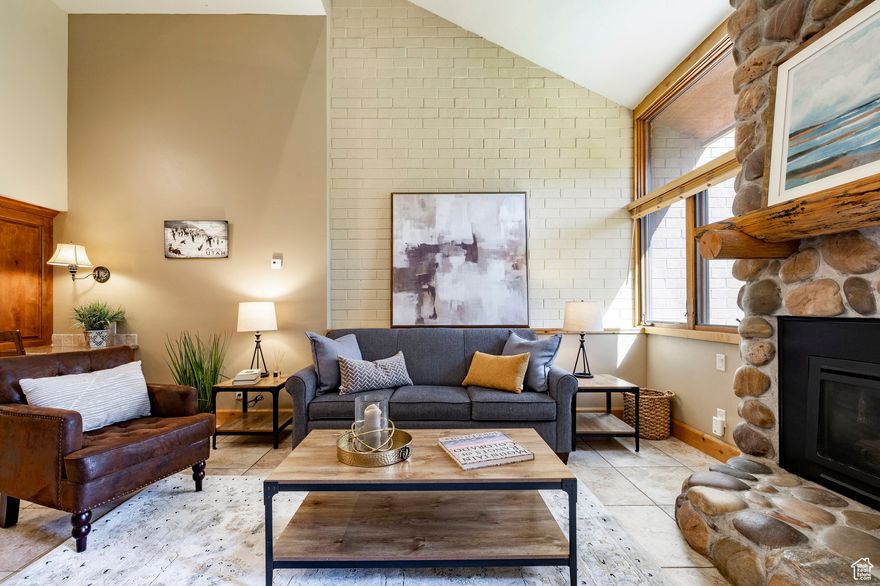 Enjoy the best of all seasons in this beautifully updated Park Avenue townhome-just across from Park City Mountain and the Municipal Golf Course. With 3 bedrooms, 3 baths, and a flexible lockout floor plan, the home is designed for both comfort and versatility. A brand-new sleeper sofa in the living room brings total sleeping capacity to 8, making it ideal for guests, family, or nightly rentals. Interior features include vaulted ceilings, a cozy gas fireplace, and a private hot tub for relaxing after outdoor adventures. Two interior sellers' lockout closets and two locked storage closets in the carport offer ample secure storage. Located just steps from the free city transit line, this townhome is walkable to skiing, dining, and more. Park Avenue Condominiums offer a pool, spa, clubhouse, tennis courts, and mature surroundings in the heart of town.