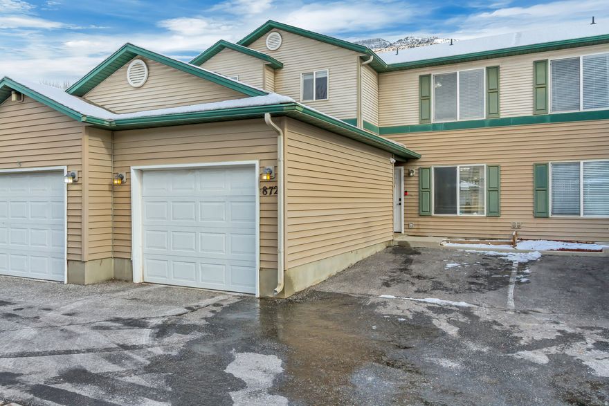 Welcome to Aspen Village's newest listing.  This home is centrally located near the base of the Wasatch Mountains, offering quick access to all things outdoors: Ogden Canyon, Bonneville Shoreline Trail, Skiing at Snowbasin, Powder Mountain, and Nordic Valley - all within 20-30 minutes. Perfect for year-round outdoor enthusiasts!  This 2-bed 2-bath unit has a 1-car attached garage with a very large common area grassy area just outside the back door.  Enjoy the incredible views, easy commute, and access to all things Utah!