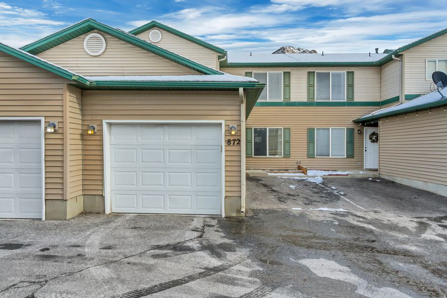 Welcome to Aspen Village's newest listing.  This home is centrally located near the base of the Wasatch Mountains, offering quick access to all things outdoors: Ogden Canyon, Bonneville Shoreline Trail, Skiing at Snowbasin, Powder Mountain, and Nordic Valley - all within 20-30 minutes. Perfect for year-round outdoor enthusiasts!  This 2-bed 2-bath unit has a 1-car attached garage with a very large common area grassy area just outside the back door.  Enjoy the incredible views, easy commute, and access to all things Utah!