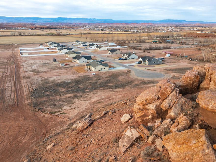 Build your dream home on the largest lot in Red Feather Subdivision! This 3.42 acre cul-de-sac lot offers space, privacy, and flexibility in one of the area's most desirable newly developed neighborhoods. Surrounded by new quality homes, this is one of the very few remaining lots available. The property offers a generous building area with additional acreage extending to a natural hillside along the south side, creating privacy, scenic views, and a unique landscape feature while maintaining plenty of space for animals, a shop, or additional improvements. Utilities are stubbed to the property for added convenience. Located in a sought-after subdivision developed by Denver Construction. This is a rare opportunity to secure premium acreage in an established neighborhood. Information provided as a courtesy, buyer to verify all information.