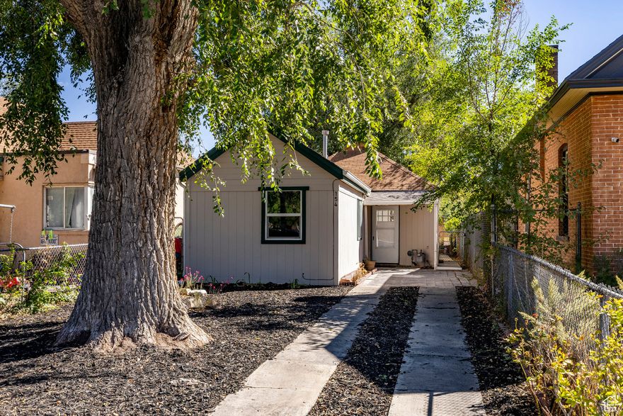 24-Hour notice is necessary for showings. No showings on Tuesdays or Thursdays. Buy a home for cheaper than a townhome and have your own private fenced yard and LARGE storage shed that could be used for a home business. Back bedroom and bathroom has it's own entrance and could be locked off for a family member or guest. Fresh paint and new flooring throughout. Super cool location next to the Fairgrounds and near the Power District and proposed MLB stadium. This area is up and coming!  Rent your driveway on activity nights for a few extra bucks! This home is so charming and cozy! Come and see!!