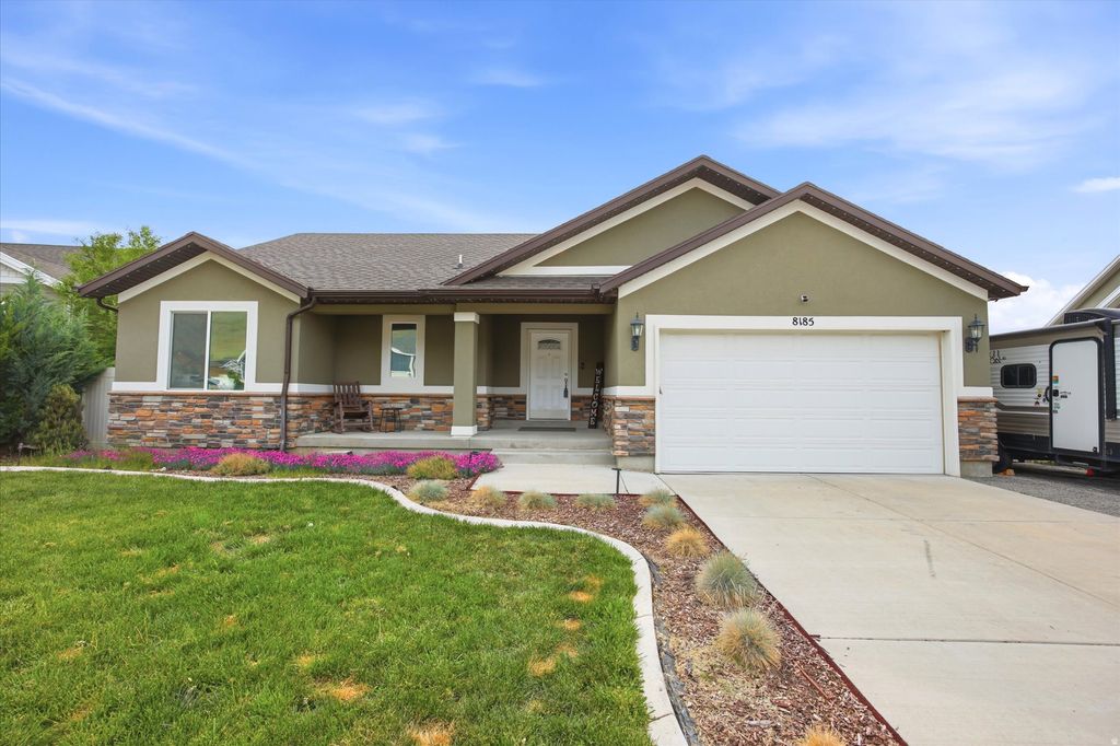 Photo of 8185 N COBBLEROCK RD E, Lake Point, UT 84074 (MLS # 2156898)