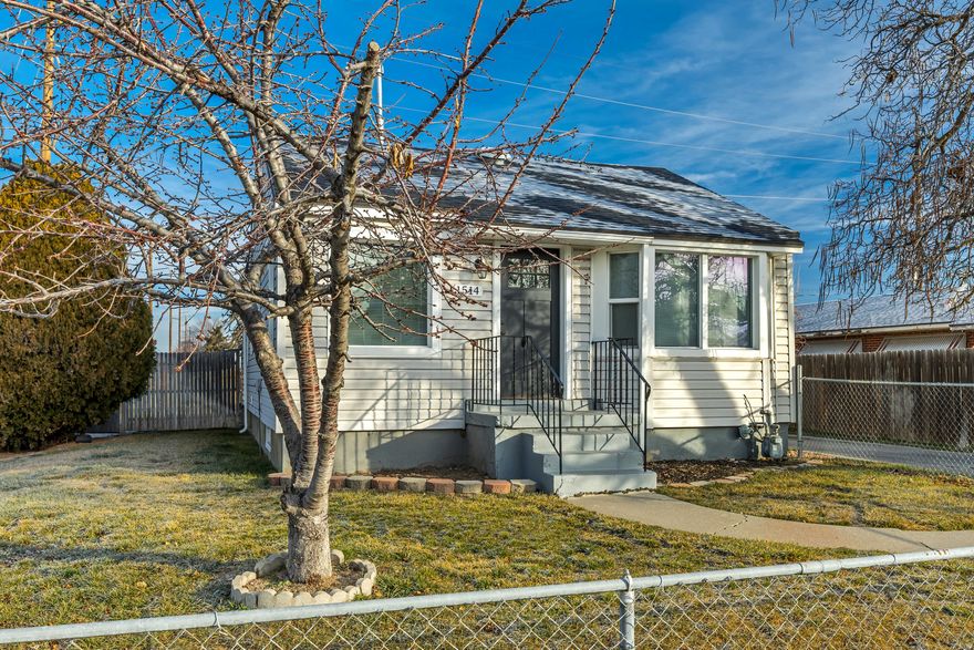 This updated Salt Lake City cottage offers charm, flexibility, and income potential in a convenient west-side location just minutes from downtown and freeway access. The main home features tasteful updates and a warm, inviting layout, while the separate mother-in-law apartment adds excellent versatility. The basement unit is currently rented for $1,345/month with a lease in place through 8/31/2026; lease details available upon request. A one-car garage adds everyday convenience, making this an ideal opportunity for an owner-occupant or buyer looking for long-term value in a central SLC location.