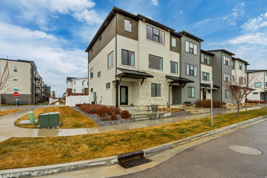 Ideally located in American Fork, this end-unit townhome offers modern and convenient living at its finest. Featuring 4 bedrooms and 2.5 bathrooms, the home is filled with natural light and showcases a spacious open family room that flows seamlessly into the fully equipped kitchen with an oversized island and semi-formal dining area. Upstairs, you will find well-appointed bedrooms, a dedicated laundry area, and a primary suite complete with a walk-in closet and private en suite bathroom. Situated just minutes from freeway access, shopping, dining, and the growing Silicon Slopes market, the location offers both comfort and connectivity. The garage also includes a newly installed 330V outlet ready for your electric vehicle charger. This home offers true turnkey living with functionality and convenience throughout. Reach out today to schedule a private showing. Buyer/Buyer's Agent to verify all information.