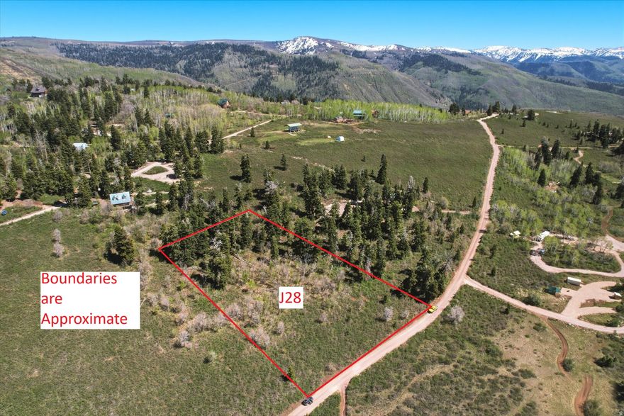 Imagine creating your own mountain retreat in the heart of Skyline Mountain Resort, where breathtaking natural beauty meets year-round recreation.  Nestled amongst a mix of mature trees and sloping meadow on a lot with beautiful mountain and valley views, this property offers a peaceful setting with the perfect balance of privacy, natural beauty, and buildability.  Wake up to the sounds of nature, breathe in crisp mountain air, and unwind beneath pristine, star-filled night skies.  This lot is adjacent to the winter sports area.  Enjoy direct access to Skyline Mountain Resort amenities, including the 9-hole golf course with driving range, swimming pool, tennis and pickleball courts, and the surrounding year-round recreational opportunities that make Skyline such a beloved destination. The Arapeen trail network offers endless opportunities to explore mountain landscapes, abundant wildlife, and the quiet beauty of the outdoors right outside your door. Whether your ideal escape includes hiking, biking, ATV riding, snowmobiling, canyoneering, or simply slowing down and enjoying the peaceful rhythm of mountain living, this location places adventure and serenity within easy reach.  Build the cabin getaway you've been dreaming of, or create a gathering place for family and friends to enjoy for generations.  Experience the perfect blend of recreation, relaxation, towering pines, mountain tranquility, and unforgettable surroundings at Skyline Mountain Resort.  Electricity available.  Water is available at a nearby fill station.  Gas would be propane, and sewer would be septic.  Winter access by tracks.