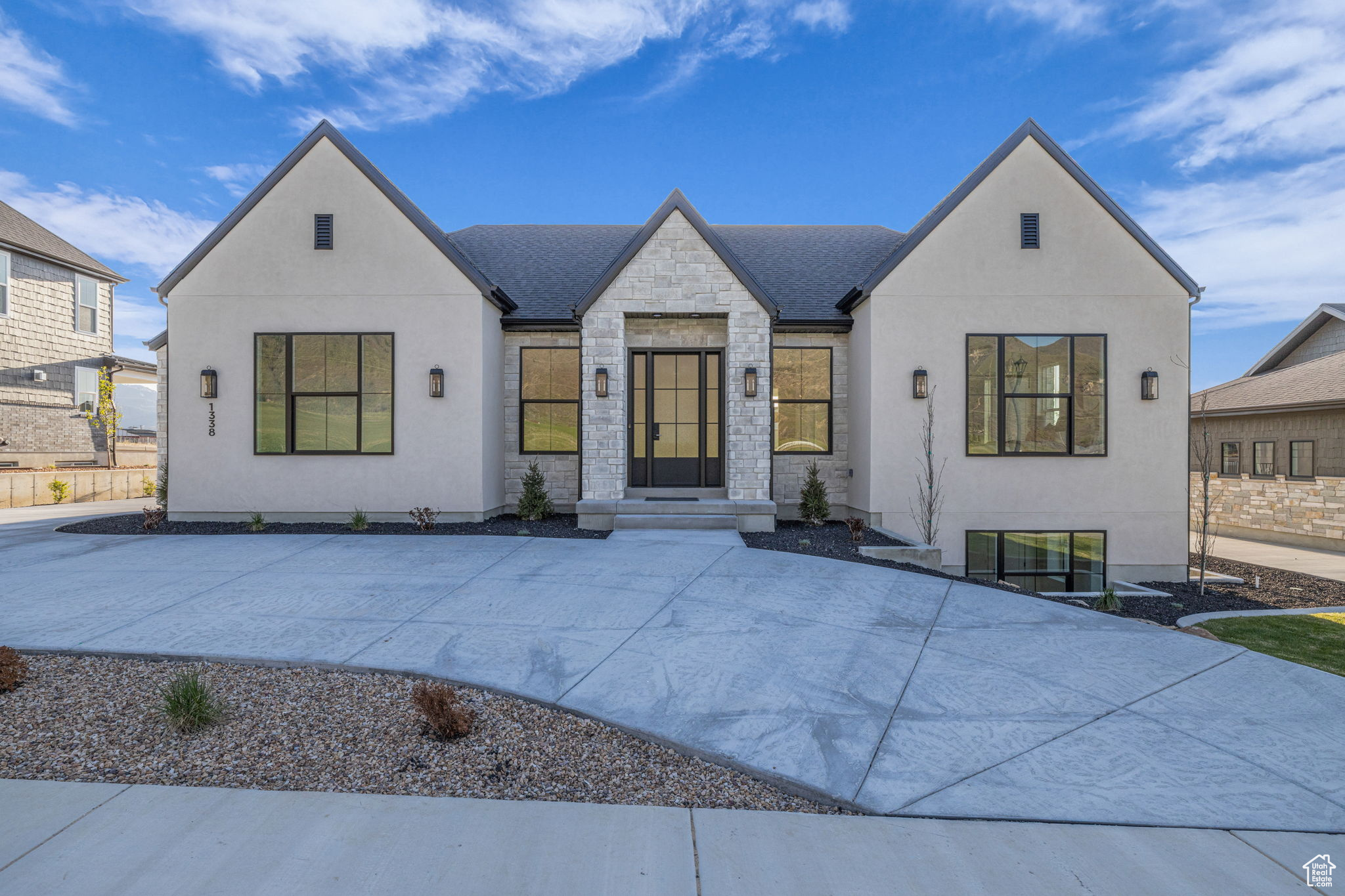 **Offering a 4.75% starting interest rate via a seller-paid 2/1 buy down and closing costs paid up to $6k. **Buyer must qualify through Seller's Preferred Lender to obtain rate buydown. Discover the perfect blend of old-world charm and modern luxury in this beautifully designed Modern European Cottage. Every detail of this home has been thoughtfully curated-from the refined tile flooring and warm accent lighting to the custom light fixtures each of which adds a splash of unique sophistication. The chef's kitchen is both elegant and functional, featuring an oversized built-in fridge/freezer, premium finishes, and generous counter space-ideal for everyday cooking or entertaining. The grand three-tier theater room comes fully equipped for unforgettable cinematic experiences. Upstairs, above the expansive 3-car garage, a private mother-in-law apartment offers flexible living space for guests or extended family-seamlessly integrated into the home's timeless design. Sitting on a spacious .3-acre lot, the backyard is ready for outdoor living and entertaining with a large patio, unobstructed mountain views, and a glimpse of Utah Lake. There's even room to add a pool or pickleball court to complete the dream. With its thoughtful layout, architectural beauty, and stunning setting, this home is a rare find-offering both a peaceful retreat and a space made for gathering.