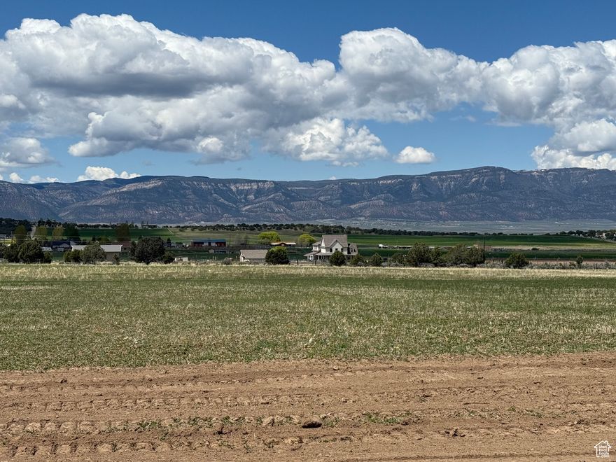 Lot 7, nestled just outside of coveted Spring City Utah, Spring City Ranches LLC  offers a peaceful escape surrounded by nature in the heart of Sanpete County. The expansive parcel features beautiful views of the majestic horseshoe and surrounding mountains creating a perfect backdrop for your dream home or a peaceful retreat.    Conveniently located Just minutes from Spring City, a charming historic town with art galleries and pioneer era architecture.  Walmart, Snow College, and a variety of shopping and dining options are only a short drive away in nearby Ephraim, Mt. Pleasant and Manti. One share of water included. Ideal for livestock , gardening, or future development. Great for homesteading, recreation, or a weekend getaway. Located in a quiet rural area with easy access via well-maintained roads.  Seller Financing Options Available. Start with just 20% down, flexible terms make this and affordable investment in your future.  Own land in one of Utah's most desirable rural areas. Perfect for now or later, this property gives you space, privacy, and real value.