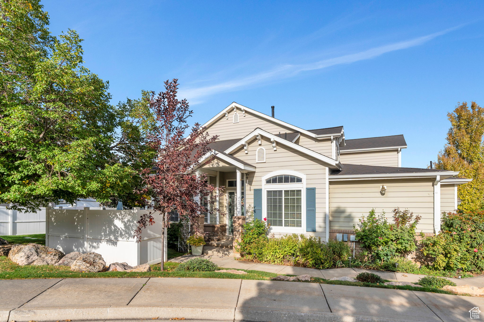 RARE opportunity to own END unit in PEACEFUL Daybreak subdivision w/GORGEOUS mature TREES, ROSE bushes and MOUNTAIN views! CLEAN, move-in READY with open floor plan, VAULTED ceilings, & GAS fireplace, ready for those cozy fall evenings. Home features laundry & PRIMARY bedroom on main level w/ full bath & LARGE walk-in closet, great for ONE LEVEL living. UPSTAIRS features 2 bedrooms with JACK & JILL bathroom. *Previous MODEL home for builder* Unfinished basement ready for your custom finishes! Patio w/fully FENCED yard, great for ENTERTAINING. Other updated items included LEVELOR blinds, FURNACE & AC (2023), WATER HEATER (2019), SNOW melt cables on roof & ALL APPLIANCES INCLUDED. LOCATION!! Close to schools, parks, shopping, Ogden Regional Medical Center, HWY 89, HWY 84 & I-15 for easy commute. Square footage per tax records. Buyer/agent to verify all.
