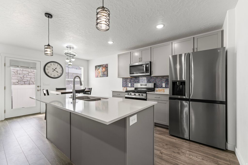 Photo of 3684 S ALLUVIAL DR W, Magna, UT 84044 (MLS # 2136784)