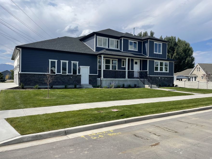 New Luxury Home in Lehi with FULL LANDSCAPING on a .57 acre lot with a 3 CAR Garage and NO CCR or HOA. The home includes a Finished 3 Bedroom/2 Bathroom Mother-in-Law Apartment in the basement with a theatre room, an Excellent Solution for Rental Income (still leaving 5 bed 4 bath for owner's personal use)!! This STUNNING new build with all the high quality finishes you want boasts a huge kitchen with extra large island, perfect for entertaining and cooking. Lots of custom cabinetry, spacious walk-in pantry, gleaming stainless steel appliances, and a covered deck off the back. The open floor plan has lots of windows, exposed beams, and high ceilings. There are TWO MASTER BEDROOMS! One master bedroom and bathroom is on the main floor. The second master bedroom is upstairs. Each master bedroom has large walk-in closets, beautiful tile work, and large soaking tubs to relax in. Sitting on .57 acres on a dead end street which offers extra parking, privacy, and security. Property also has ANIMAL RIGHTS so bring your animals along!!! Schedule your showing today!